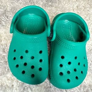 Green Crocs toddler size 4
